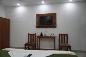 TV a/nebo společenská místnost v ubytování Hotel Frolic Stay
