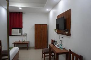 TV a/nebo společenská místnost v ubytování Hotel Frolic Stay