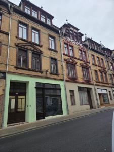 a building on the side of a street at Apartments Angels o k b in Altenburg