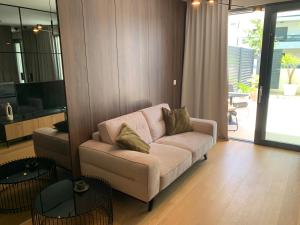 Ein Sitzbereich in der Unterkunft Capitol Suites Exclusive