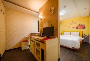 Postel nebo postele na pokoji v ubytování Hongdae Sinchon Touch Motel + 3 fotografie
