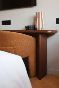 Postel nebo postele na pokoji v ubytování Hotel & Restaurants - Maison Chabran