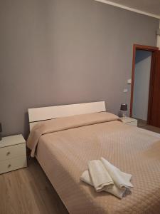 Postel nebo postele na pokoji v ubytování Petraleuka