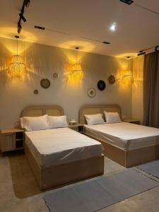 Ένα ή περισσότερα κρεβάτια σε δωμάτιο στο New Cairo Chic Studio 3