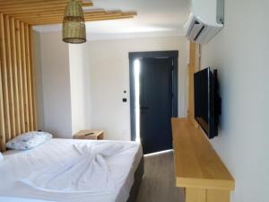 Μια τηλεόραση ή/και κέντρο ψυχαγωγίας στο METTE Otel