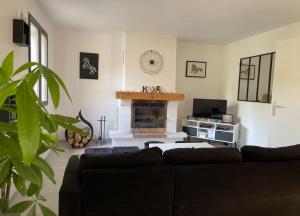 Χώρος καθιστικού στο Maison avec jaccuzi