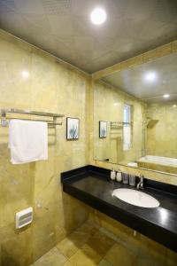 Ένα μπάνιο στο Mira Apartment & Hotel