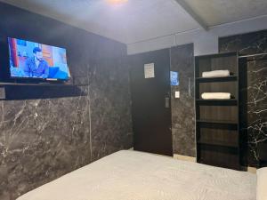 Μια τηλεόραση ή/και κέντρο ψυχαγωγίας στο El Hostalito Metepec +121 φωτογραφίες