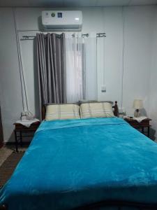 Postel nebo postele na pokoji v ubytování Christos House