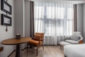 Zona d'estar a UrCove By Hyatt Guangzhou Huadu Baiyun International Airport