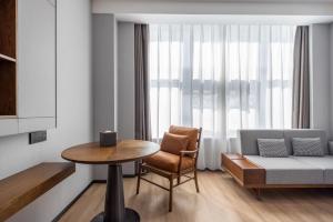 Zona d'estar a UrCove By Hyatt Guangzhou Huadu Baiyun International Airport