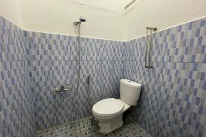 Koupelna v ubytování Agave Hotel Siantar