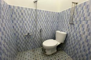 Koupelna v ubytování Agave Hotel Siantar