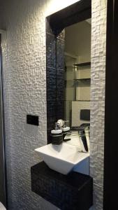 Et badeværelse på Apartament 3D