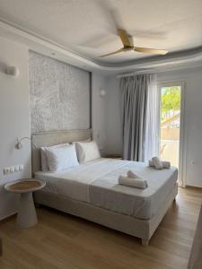 Posteľ alebo postele v izbe v ubytovaní Valetta Inn