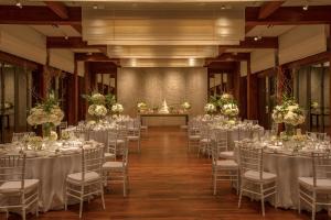 a banquet hall with tables and chairs in a building at Rosewood Phuket in Patong Beach +37 photos