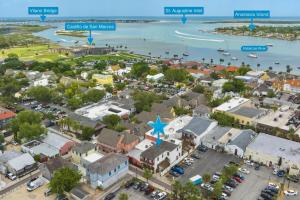 an aerial view of a small town with a harbor at 61 Spanish St. Unit B in St. Augustine