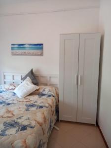 Ένα ή περισσότερα κρεβάτια σε δωμάτιο στο Casa del Moro