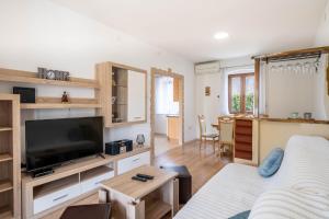 TV a/nebo společenská místnost v ubytování Casa Olea
