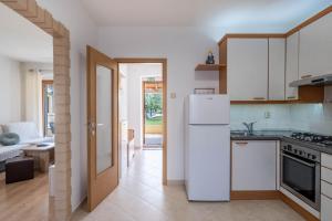 Kuchyň nebo kuchyňský kout v ubytování Casa Olea