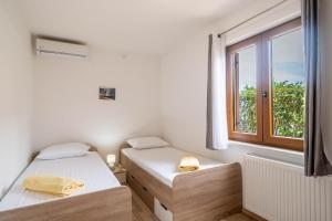 Postel nebo postele na pokoji v ubytování Casa Olea