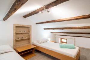 Postel nebo postele na pokoji v ubytování Casa Olea