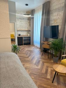 TV a/nebo společenská místnost v ubytování Vanalinna Boutique Hotel