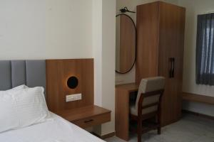 Postel nebo postele na pokoji v ubytování Hotel River View