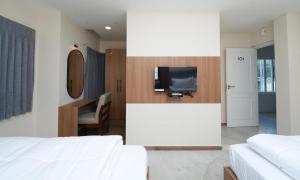 Postel nebo postele na pokoji v ubytování Hotel River View