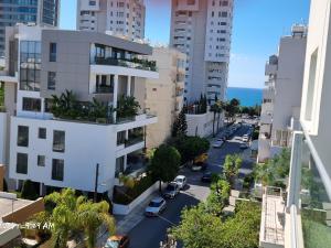 an aerial view of a city street with buildings at Beach apartment's in Limassol