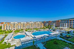 an aerial view of a resort with a swimming pool at PREMIER HOUSE BEACH Hotel in Sveti Vlas