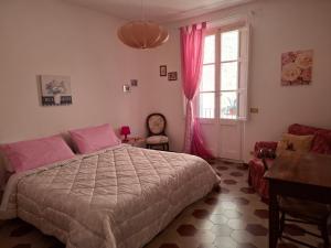 Posteľ alebo postele v izbe v ubytovaní Residenza Le Ortensie