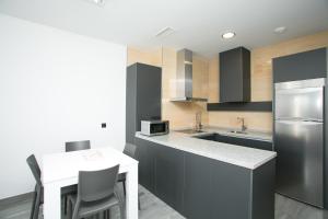 Kuchyň nebo kuchyňský kout v ubytování Apartamentos Fuengirola Playa