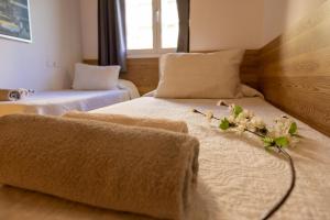 A bed or beds in a room at Dalt Vila Salou
