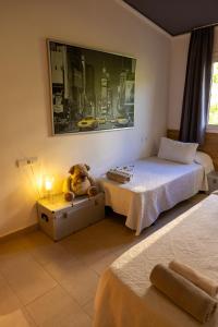 A bed or beds in a room at Dalt Vila Salou