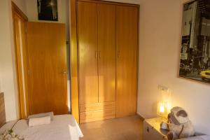 A bed or beds in a room at Dalt Vila Salou