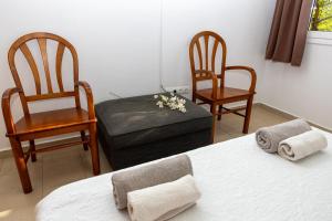 A bed or beds in a room at Dalt Vila Salou