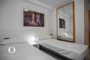 Postel nebo postele na pokoji v ubytování Holiday Primera Linea Magic World + 28 fotografií