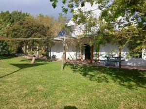 Κήπος έξω από το Arkelshoek Cottages