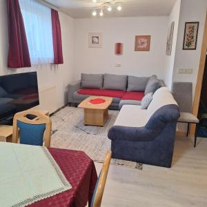 Posedenie v ubytovaní Haus Trojer