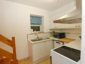 Kuchyň nebo kuchyňský kout v ubytování Holme Cottage + 12 fotografií