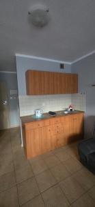 Een keuken of kitchenette bij Ośrodek Wczasowy Bursztyn