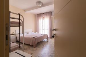 Postel nebo postele na pokoji v ubytování Hotel Altamira