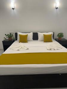 Una cama o camas en una habitación de Sky wing transit hotel