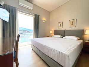 Postel nebo postele na pokoji v ubytování Hotel Saron