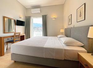 Postel nebo postele na pokoji v ubytování Hotel Saron