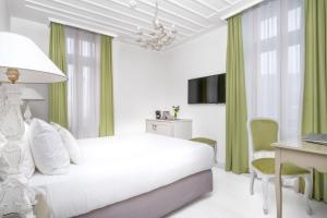 Postel nebo postele na pokoji v ubytování Micra Anglia Boutique Hotel & Spa