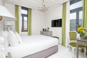 Postel nebo postele na pokoji v ubytování Micra Anglia Boutique Hotel & Spa