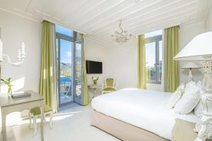 Postel nebo postele na pokoji v ubytování Micra Anglia Boutique Hotel & Spa