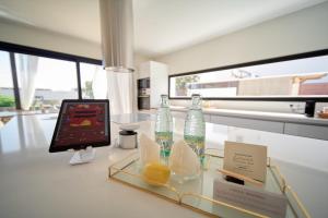 A television and/or entertainment centre at UNIQUE Homes Lajares - Only Adults
